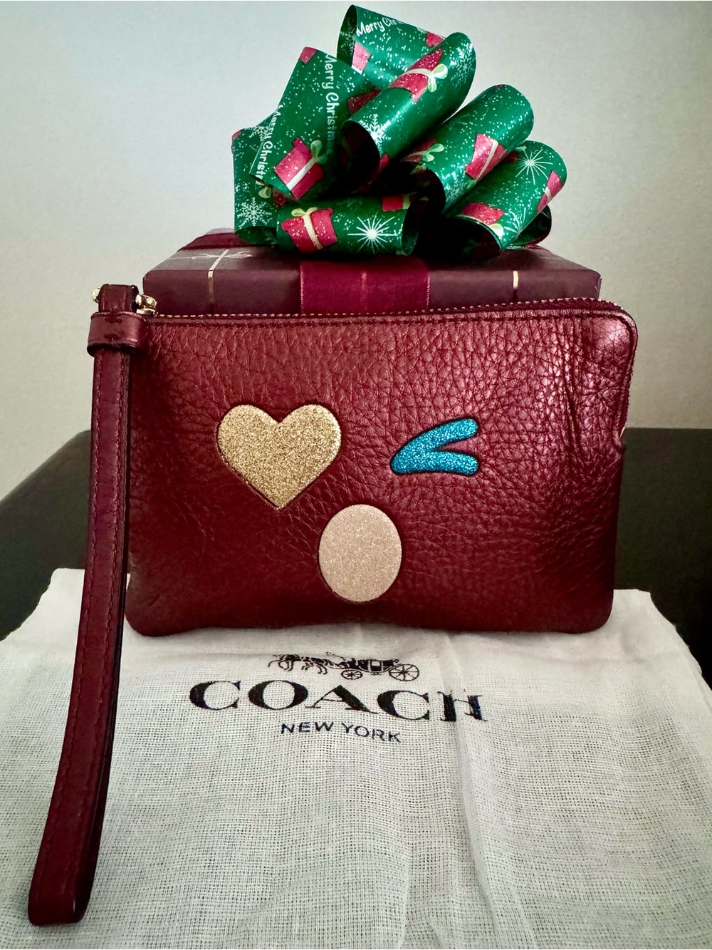 COACH Metallic Burgundy Pebble Leather Emoji Corner Zip Wristlet + Dust Bag EUC